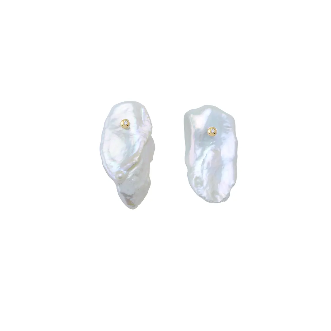 14K Gold Baroque pearl stud earrings with a Diamond